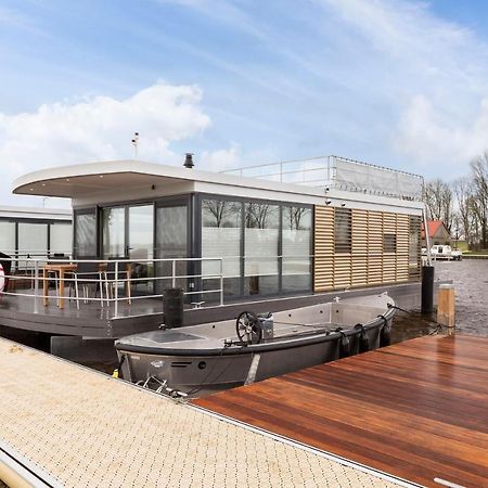 Welcome In - Houseboat 'Elysium' Met Eigen Aanlegsteiger Sneek - Offingawier Exterior foto